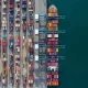 Aerial view cargo ship terminal, Unloading crane of cargo ship terminal, Aerial view industrial port with containers and container ship.