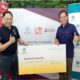 Christopher Teo, Chief Executive Officer, Tokio Marine Life Insurance Singapore (TMLS), presenting a donation cheque of $15,000 to Jason Foo, Chief Executive Officer, Dementia Singapore, at the “Just the Way You Are” Appreciation Dinner.