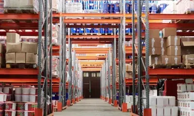 boxes with RFID labels pilled in a warehouse with concrete floor